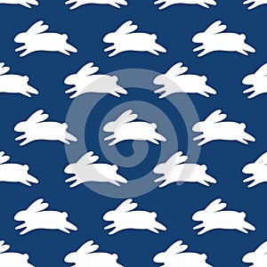 Seamless pattern with white rabbits