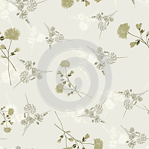 Seamless pattern of wild small green and gray flowers and branches on a light green background. Watercolor