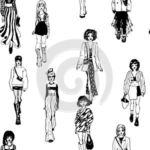 Seamless pattern. Women in trendy clothes. Defile sketch.