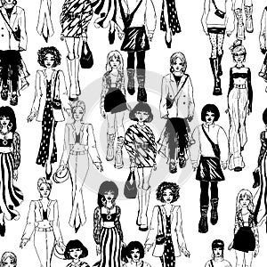 Seamless pattern. Women in trendy clothes. Defile sketch.