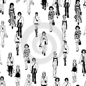 Seamless pattern. Women in trendy clothes. Defile sketch.