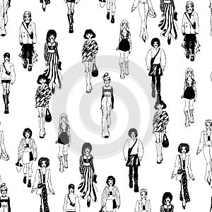 Seamless pattern. Women in trendy clothes. Defile sketch.