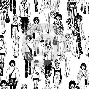 Seamless pattern. Women in trendy clothes. Defile sketch.