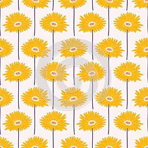 Seamless pattern with yellow gerbera flowers on a beige background