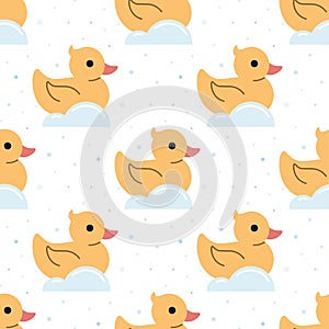 Seamless pattern with yellow rubber ducks