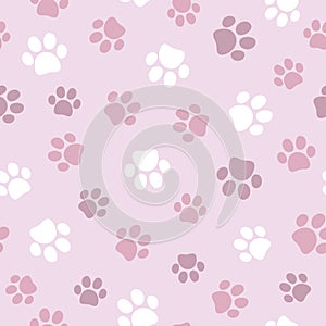 Seamless pet paw pattern. Cat or dog footprint on pink background.