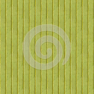 Seamless photo texture of yellow plastic panel from sun light