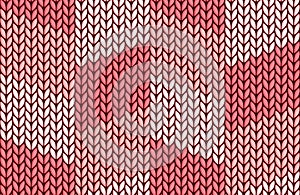 Seamless pink knitted background.
