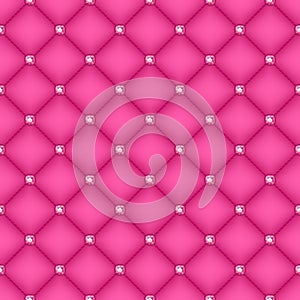 Seamless pink quilted background with pins.