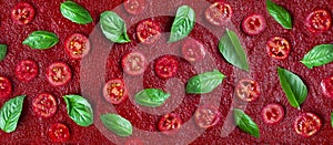 Seamless pizza ingredients pattern. Tomatoes and basil on a red tomato sauce. Flat lay