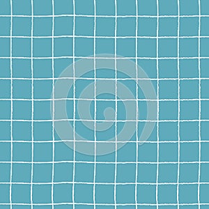 Seamless plaid pattern with hand drawn grid on blue background