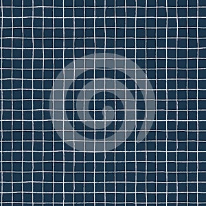 Seamless plaid pattern with hand drawn white grid on dark background