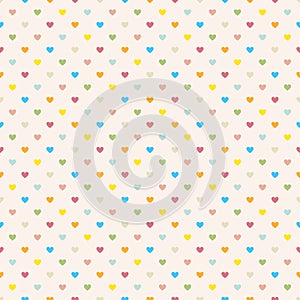 Seamless polka dot colorful pattern with hearts.