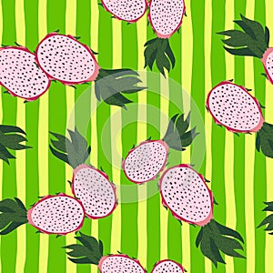 Seamless random pattern with pink dragon fruits ornament. Green bright striped background