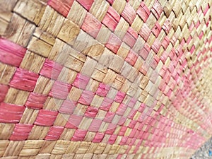 Seamless realistic old bamboo weave basket repeat pattern. Texture of golden yellow rattan mat for background and interior design