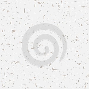 Seamless recycled speckled beige paper background. Vector paper texture with gold particles of debris.