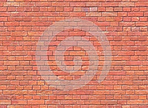 Seamless red brick wall texture. Brick wall wallpaper. Texture for continuous replicate.