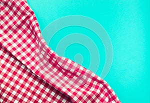 Seamless red checkered fabric with blue background.