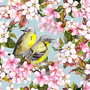Seamless repeated floral pattern - pink cherry, sakura and apple flowers with birds. Watercolor