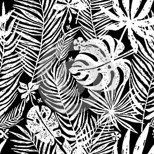 Seamless repeating pattern with white silhouettes of palm tree leaves in black background. Vector botanical illustration