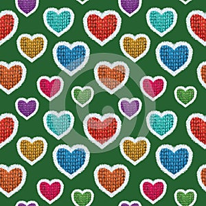 Seamless Romantic Vintage Scandinavian Style Handmade Colorful Knitted Fur Trim Hearts on green background pattern