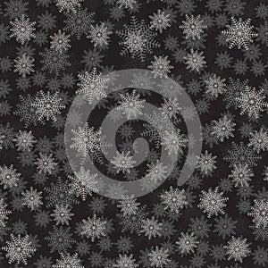 Seamless snowflakes pattern on a black backdrop. Beautiful christmas background. illustration.