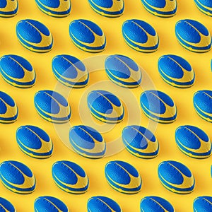 Seamless sport pattern with ball on yellow background