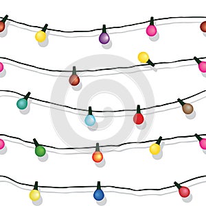 Seamless string of Christmas lights isolated on white