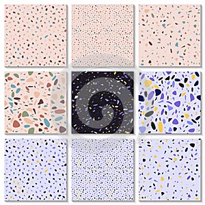 Seamless terrazzo patterns set. Hand crafted and unique patterns repeating background. Granite textured shapes in different color