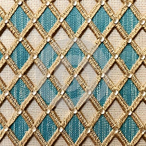 Seamless texture of fabric with a grid of golden threads and beads