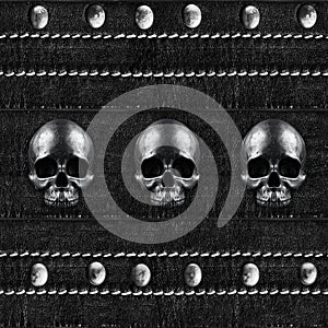 Seamless texture of leather belt with rivets and skulls