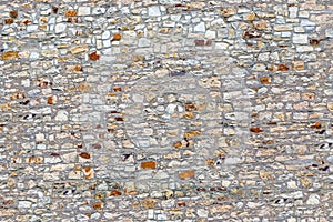 Seamless texture old gray stone wall