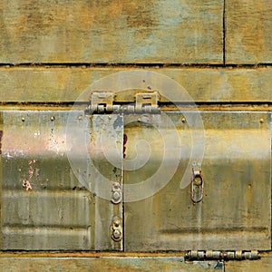 Seamless texture of rusty armor with rivets and hinges