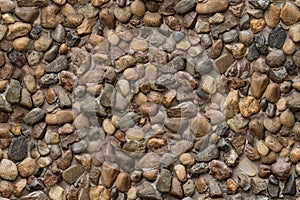 Seamless texture of stone wall river rock pattern nature background