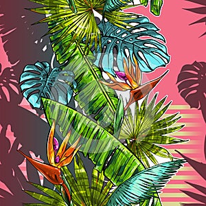 Seamless texture on the theme of the tropics, jungle from palm leaves, monstera, banana leaves, strelitzia and heliconia flowers.