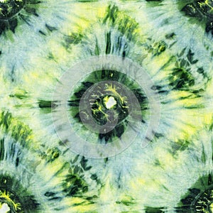Seamless tie-dye pattern of green and yellow color