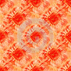 Seamless tie-dye pattern of red and orange color on white silk.