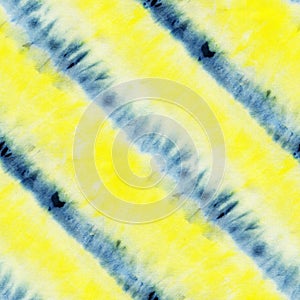 Seamless tie-dye pattern of yellow and blue color on white silk