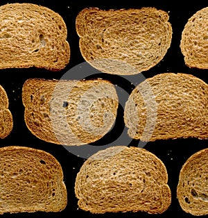 Seamless tile: slices of Toasted Bread Against a Black Background