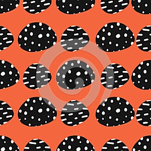 Seamless vector background with abstract dot shapes with black and white texture on orange red. Repeating pattern