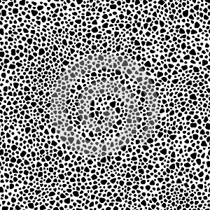 Seamless vector black and white texture of spots or pores of irregular shape and different size, black pattern