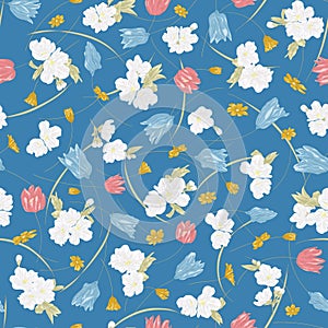 Seamless vector floral pattern with hand drawn spring flowers in pink and white colors on blue background. Ditsy print in sketch
