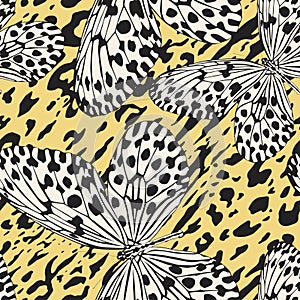 Seamless vector multicolor butterflies pattern. Butterfly on zebra leopard print. Trendy animal motif wallpaper