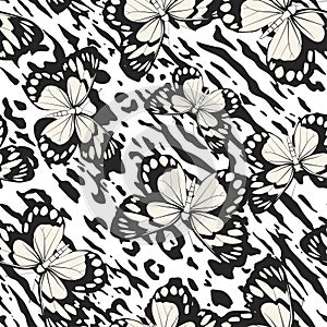 Seamless vector multicolor butterflies pattern. Butterfly on zebra leopard print. Trendy animal motif wallpaper.