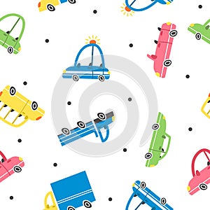 Seamless vector pattern with cars. Multicolored different cars
