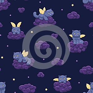 Seamless vector pattern of cute fluffy winged kittens on the background of the night sky with stars and clouds