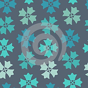 Seamless vector pattern of decorative abstract blue flower shapes on grey