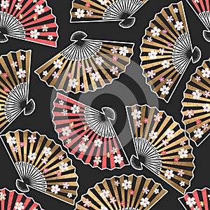 Seamless vector pattern with gold and red traditional asian fans and cherry flowers isolated on black background. Design for print