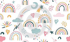 Seamless vector pattern with hand drawn rainbows and sun. Trendy baby texture