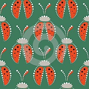 Seamless vector pattern with insects, symmetrical background with red decorative closeup ladybugs, on the green backdrop.